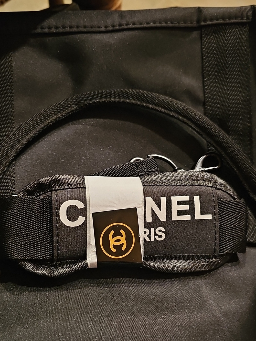 CHANEL Black Duffel with White Or Black CC Emblem - Picture 10 of 10